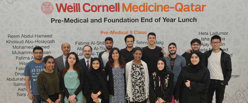 Dr. Rachid Bendriss and Dr. Marco Ameduri with some of the foundation and premedical students.