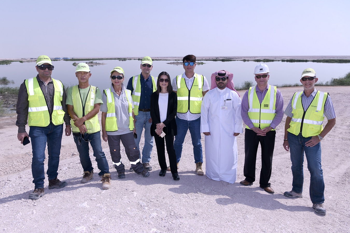 Dr. Kuei-Chiu Chen (center), with Ashghal employees and contractors and sub-contractors who have helped create the lagoons.