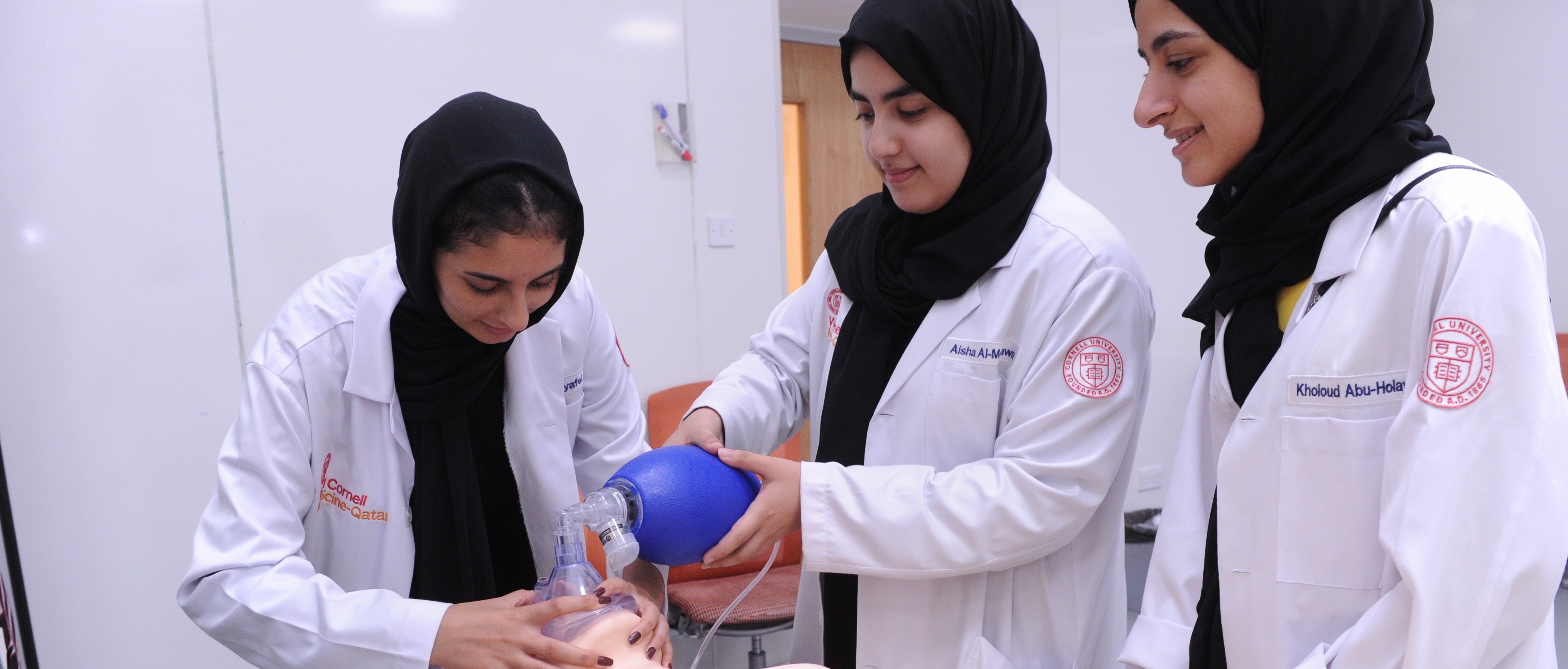 First-year students get to grips with a bag-valve mask ventilator.