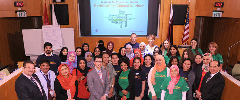 Dr. Ravinder Mamtani and Dr. Sohaila Cheema, far right, with some of the 55 participants who  completed the 50-hour Certificate Clinical Nutrition course.