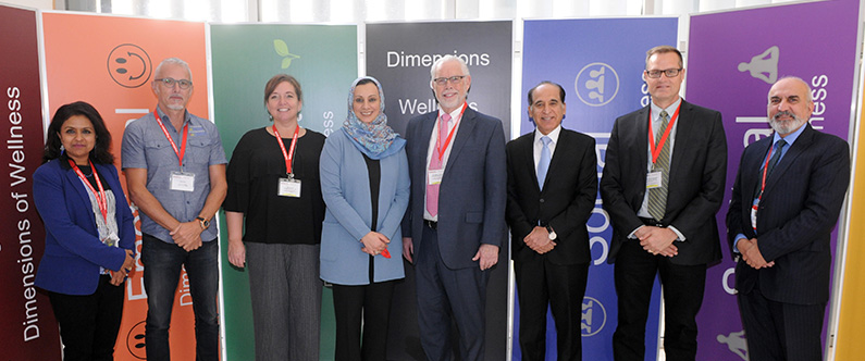 Dr. Sohaila Cheema, Dr. Arthur Hengerer and Dr. Ravinder Mamtani (center), with speakers at the symposium.