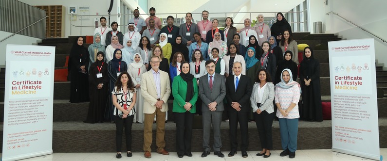 Dr. Javaid Sheikh (center-front row), Dr. Ravinder Mamtani (third right-front row), Dr. Sohaila Cheema (third left-front row), and other speakers and participants.