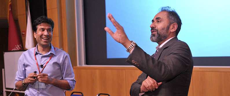 WCM-Q’s Dr. Rayaz Malik, right, and visiting diabetes expert Dr. Syed Abbas Raza, quiz participants on the material they learned at the conference.