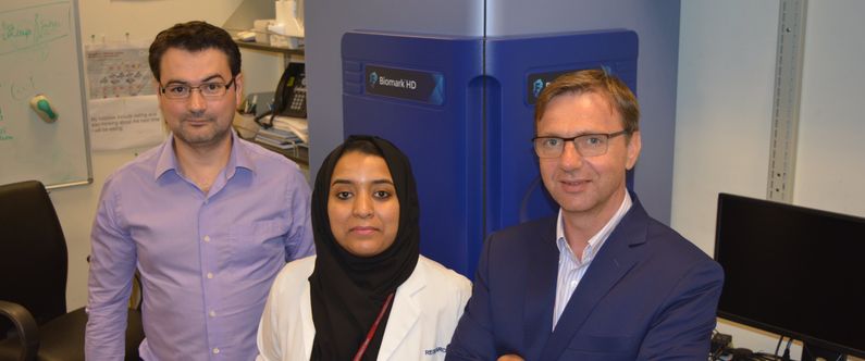WCM-Q researchers Dr. Rudolf Engelke, left, Hina Sarwath and Dr. Frank Schmidt with the new Olink equipment.