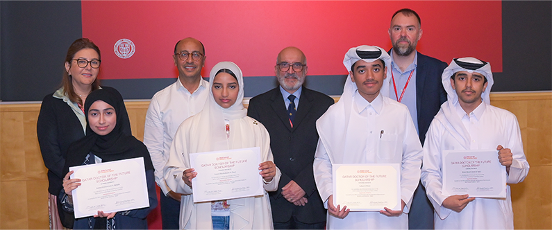 Front row, from left: Winning students Fatma Mohammed Al-Abdulla, Noora Abdulrahman Al Thani, Sultan Al-Malki and Khalid Abdulrahman Al-Nabti. 