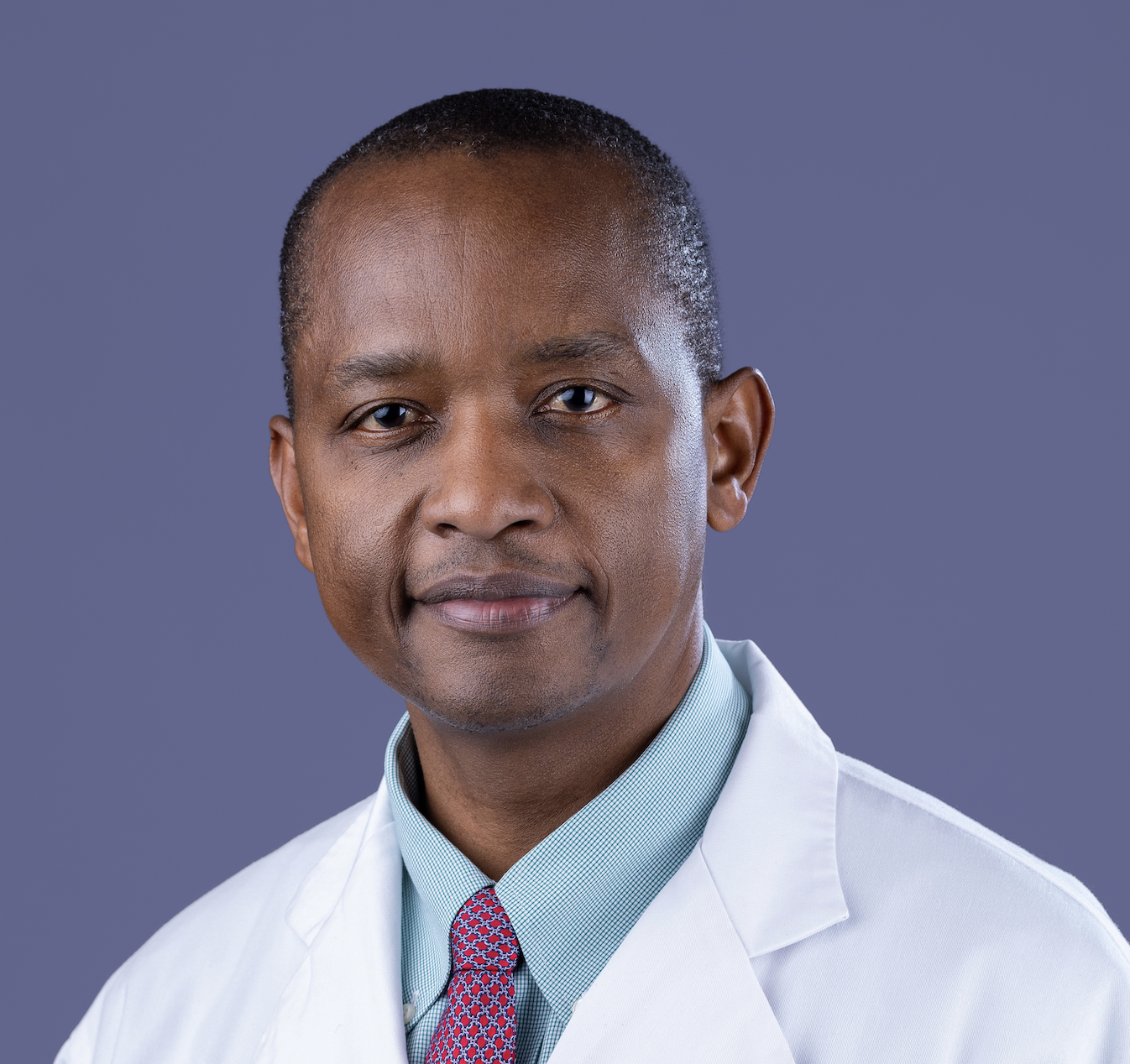 Dr. Mange Manyama