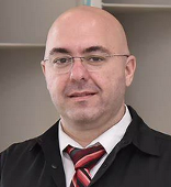 Dr. Michael Nomikos