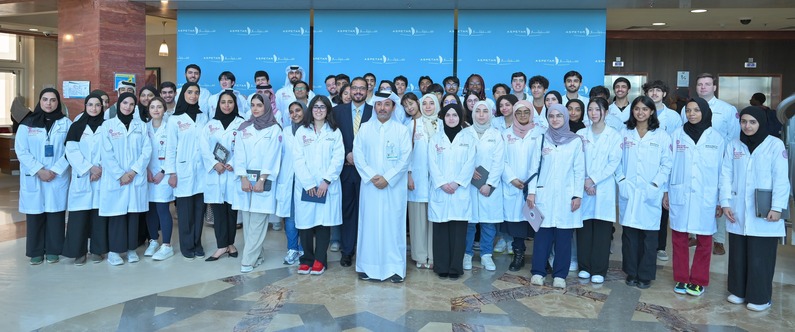 Dr. Mohammad Yousef, officials from Aspetar, and pre-med students.
