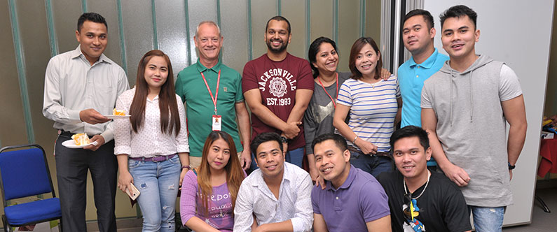 Director of facilities management John Doig (third from left) with some of WCM-Q’s contracted staff members.