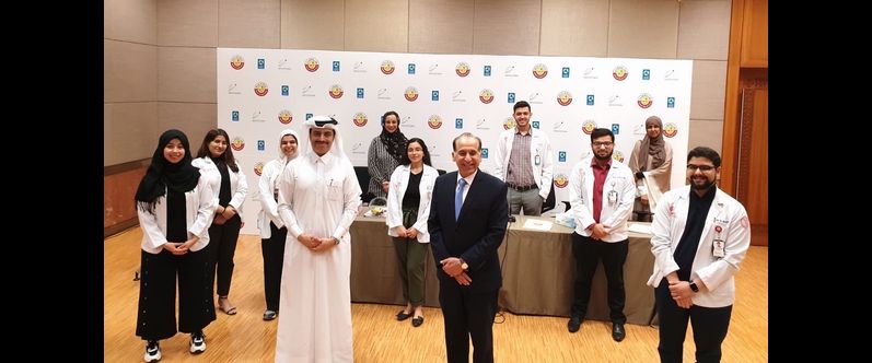 Sheikh Dr. Mohammed Al-Thani of the Ministry of Public Health (front left), Dr. Ravinder Mamtani of WCM-Q (front center) and Dr. Sohaila Cheema (back left) observing physical distancing with WCM-Q students enrolled on the new elective course.