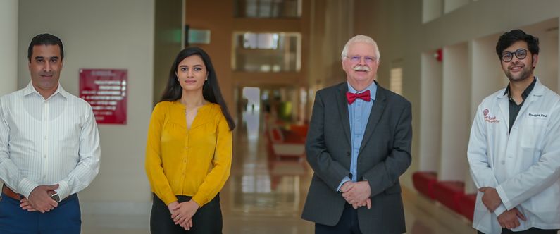 From left: WCM-Q researchers Dr. Ali Chaari, student Ridhima Kaul, Dr. Dietrich Büsselberg, and student Pradipta Paul investigated the potential of naturally occurring plant compounds to fight viral infections such as SARS-CoV-2, the virus that causes COVID-19. 