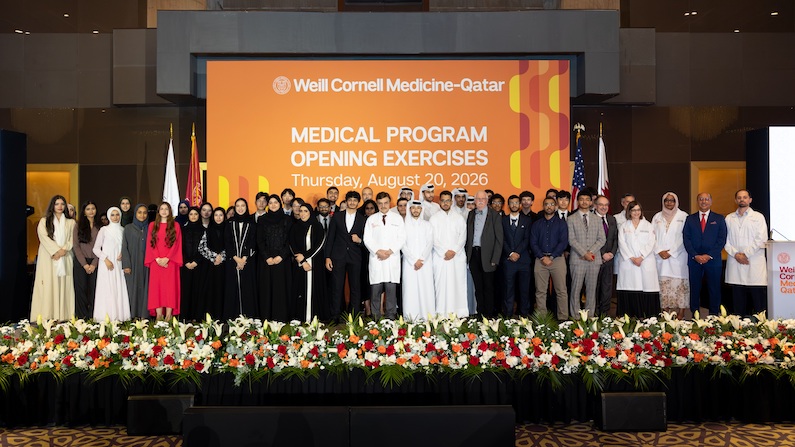 WCM-Q students who were inducted into the pre-medical program, pictured with members of the faculty. 