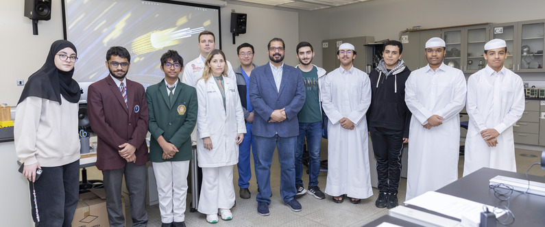 Dr. Mohammad Yousef (center) with WCM-Q instructors Hana Saba and Branislav Alaksic, plus local high school students at a training workshop for the recent International Juniors Science Olympiad (IJSO).  