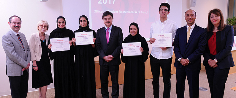 Dr. Javaid Sheikh, dean of WCM-Q, with winners and faculty.