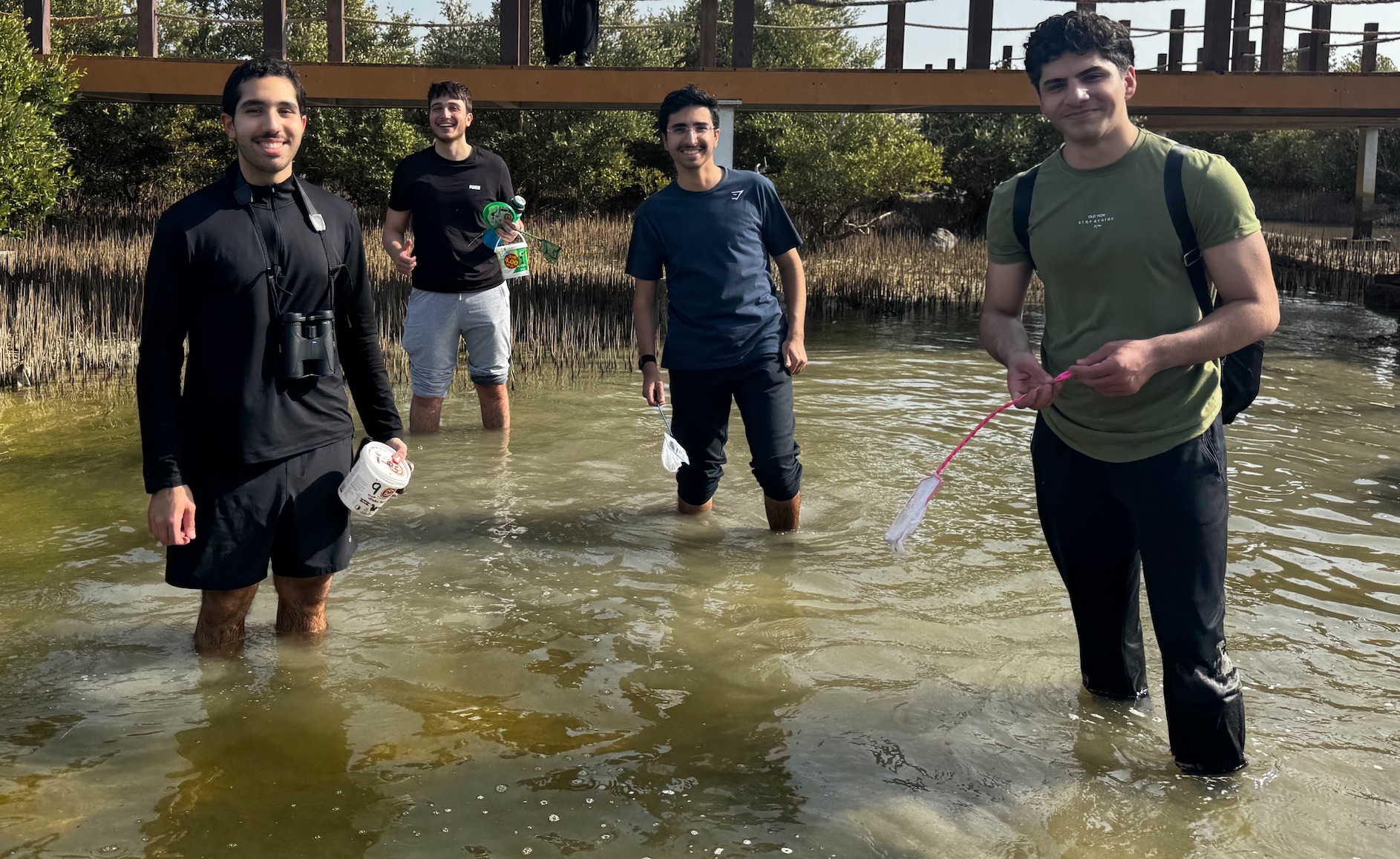 WCM-Q students collect specimens on the Purple Island.