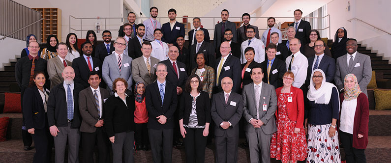 The residency program directors with WCM-Q faculty, students and staff.