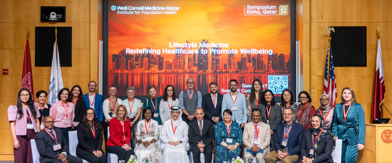 A group picture of Sheikh Dr. Mohamed Bin Hamad Al Thani (fifth left-front row) and Dr. Ravinder Mamtani (fifth right-front row), and other participants at the event.