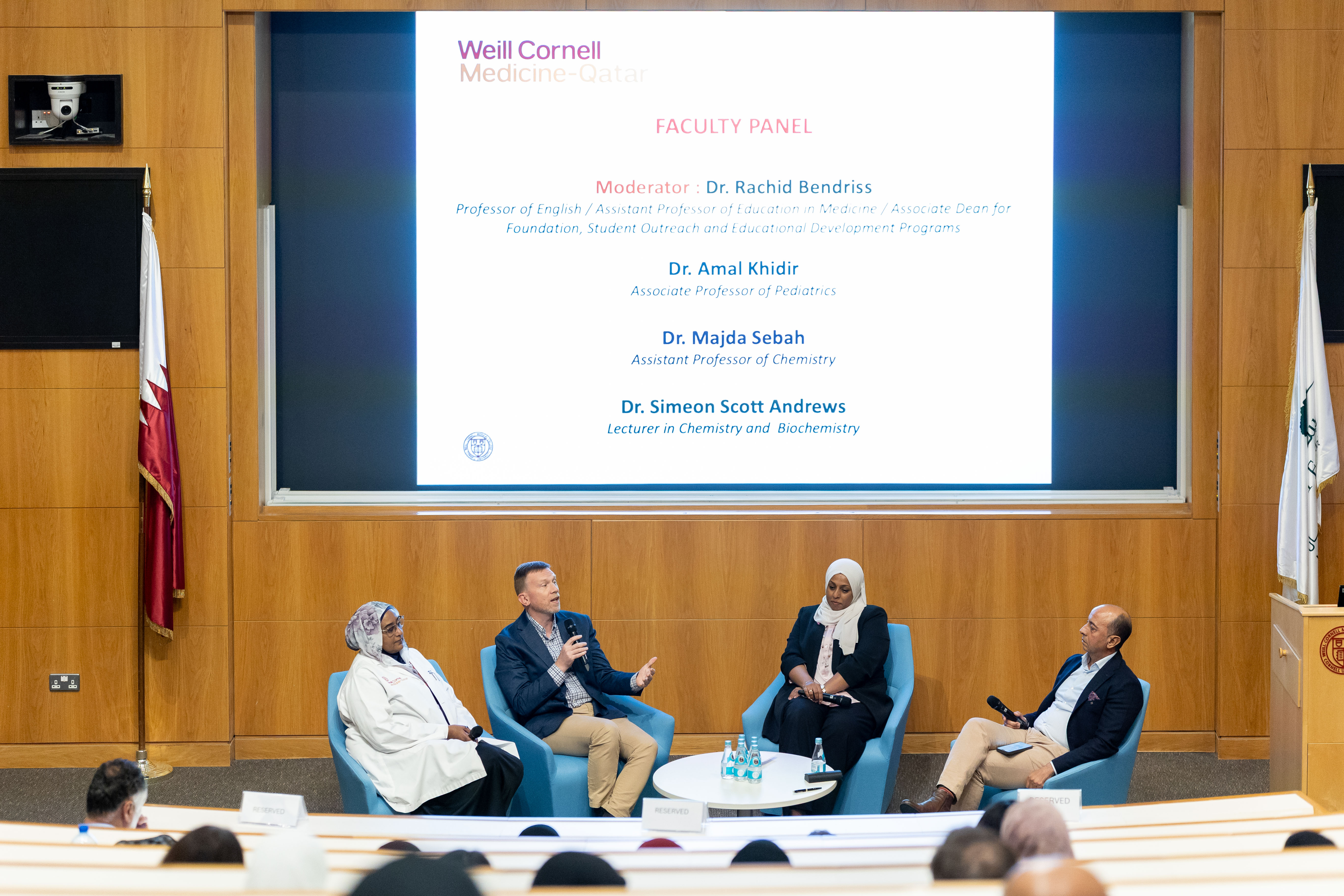 The faculty panel during the special Open House.