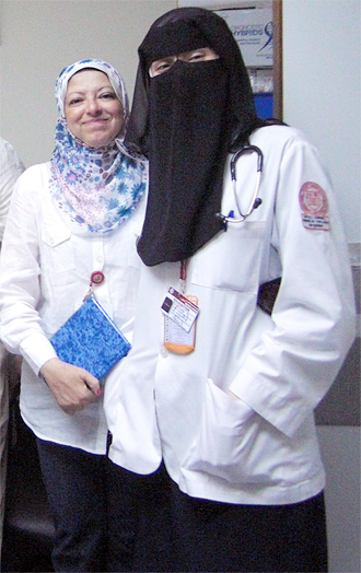 Director of CCCHC, Maha Elnashar, with student Rana Emam who helped to treat the 'missing' patient