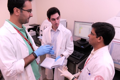 Salah Mahmoud (center) has been involved in all aspects of  WCMC-Qs biomedical research program.