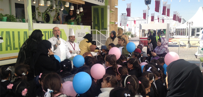 Young visitors help to make a tasty, healthy salad