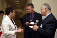 Dr. Storey-Johnson exchanges views with participants from the HMC
