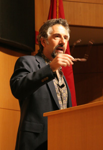 An animated Peter Fortunato recites a poem about one of his horse riding experiences in Doha titled "Jumping for the Moon".
