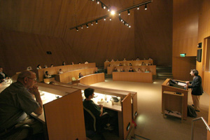 The audience listens to poems about the Doha experience.