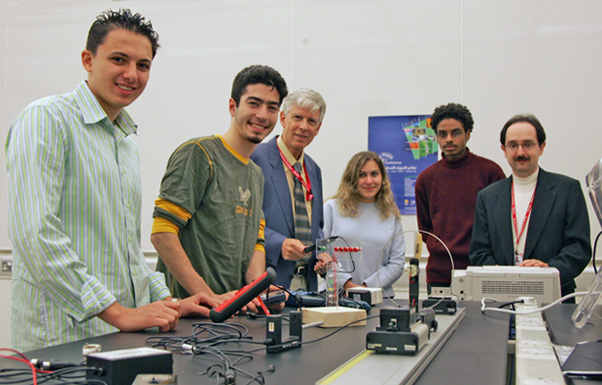 Anas Ahmad, Anas Abou-Ismail, Professor of Physics Dr. Roger Hinrichs, Suzan Skef, Mazin Hussein and Senior Lecturer in Physics Dr. Marco Ameduri discuss their presentations at the first Qatar Physics Conference in December.