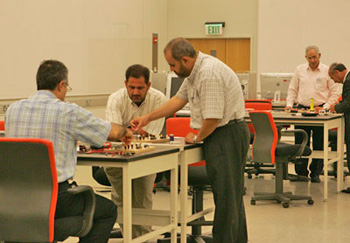 Teamwork: teachers put themselves in their students’ shoes as they work through an experiment.