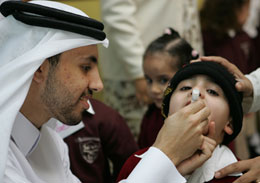 Moving in the right direction: Essa Abuhelaiqa, a Qatari, helps the National Health Authority in its latest immunization efforts.