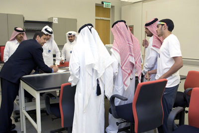 A supportive environment: Dr. Imad Makki guided visitors through an overview of WCMC-Q, from entrance requirements to work in the lab.